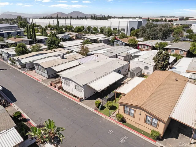 an aerial view of a city with lots of residential buildings