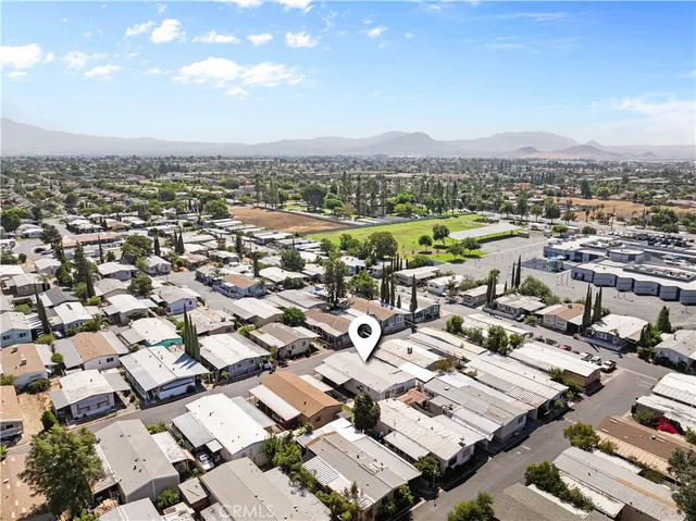 a view of a house with a yard and garage