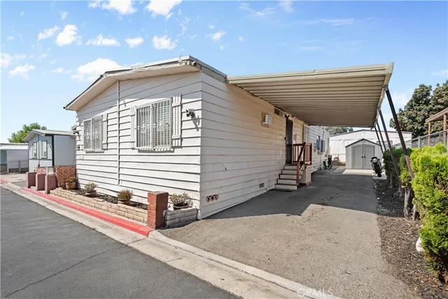 a view of a house with a street