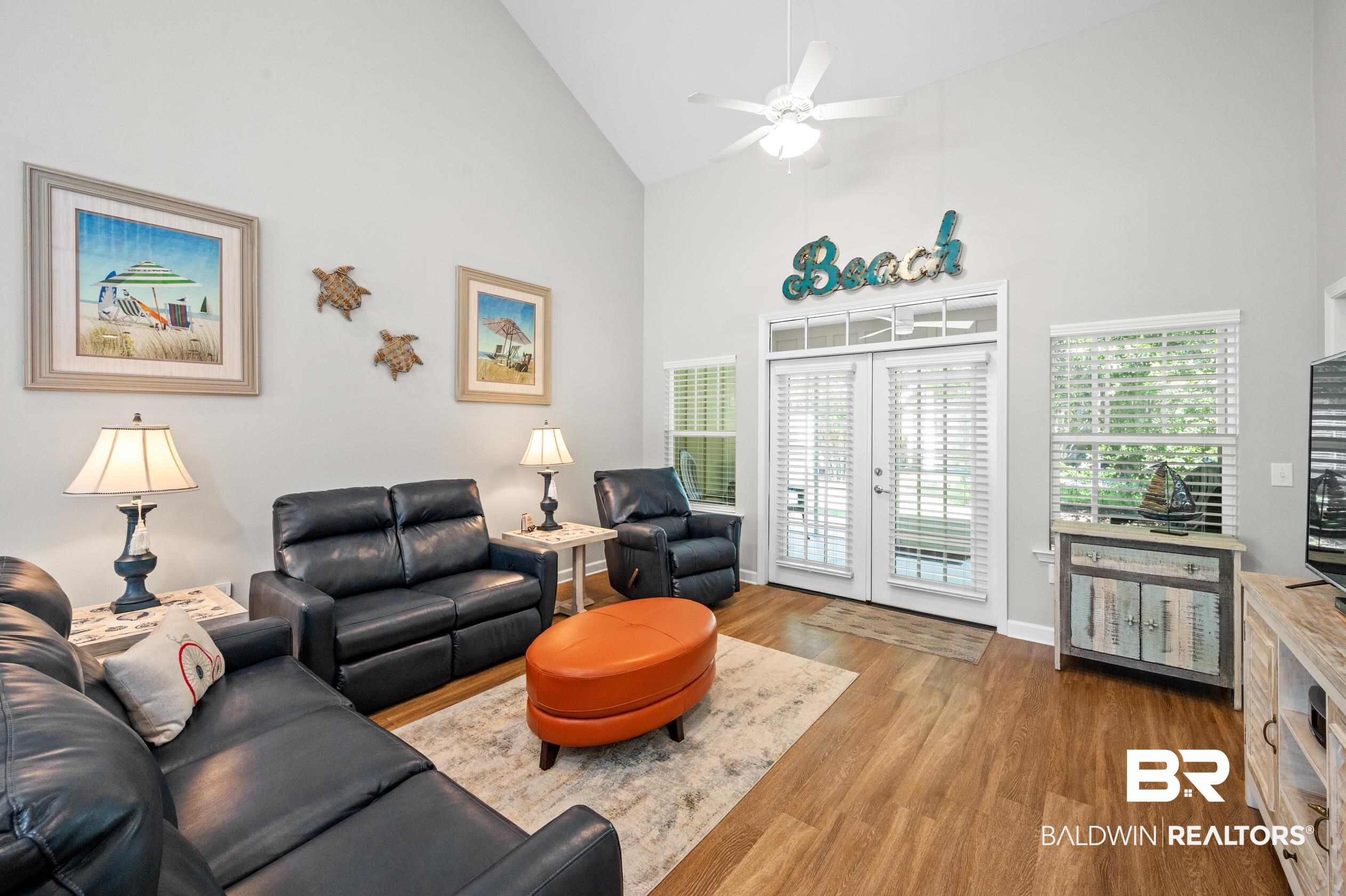 430 West Fort Morgan Road, Unit 1902 Gulf Shores, AL 36542 - Photo 5 of 59 Living room with french doors, hardwood / wood-style floors, high vaulted ceiling, and ceiling fan