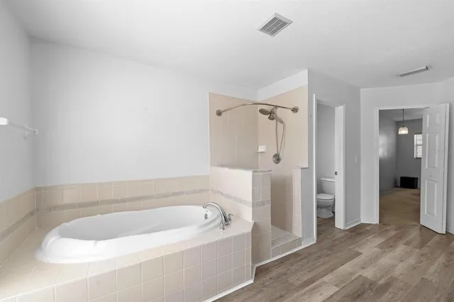 a bathroom with a bathtub
