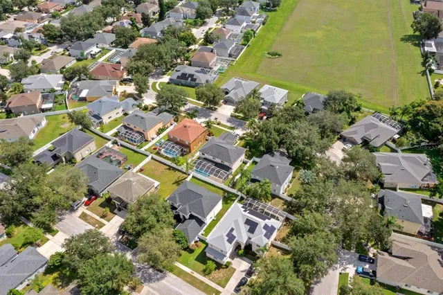 an aerial view of residential building with outdoor space