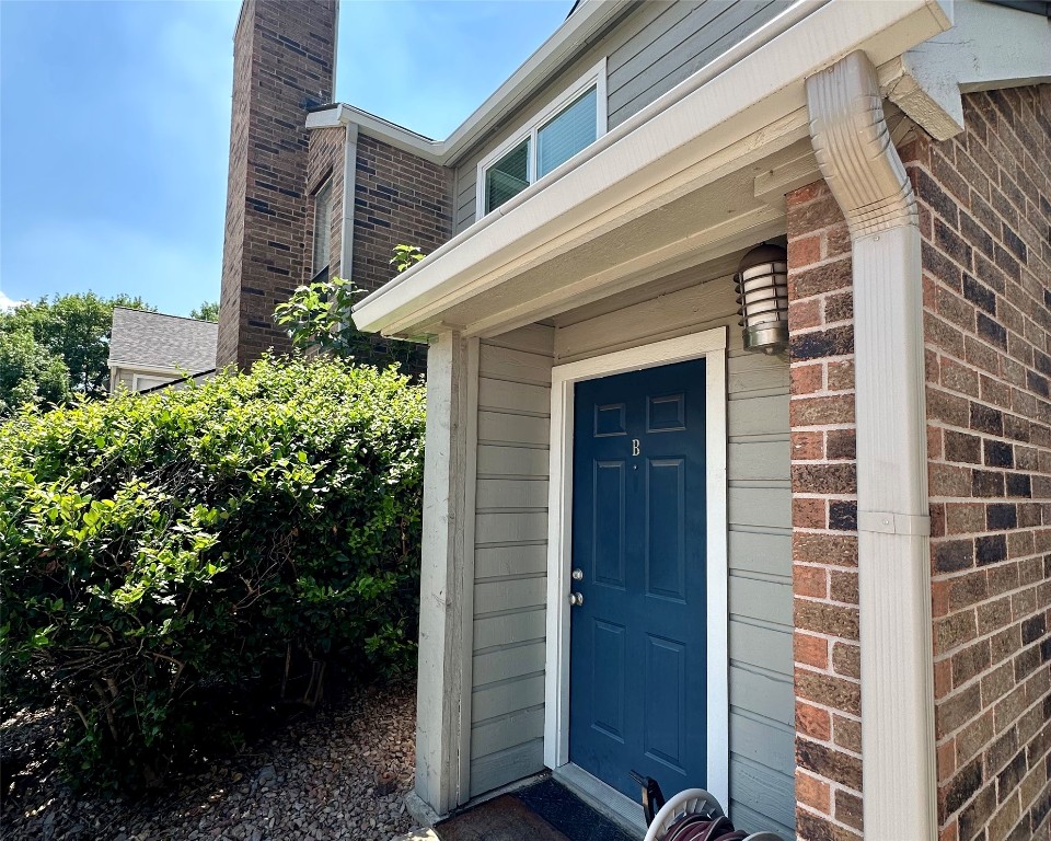 2018 West Rundberg Lane, Unit 5B Austin, TX 78758 - Photo 2 of 23 a view of front door and porch