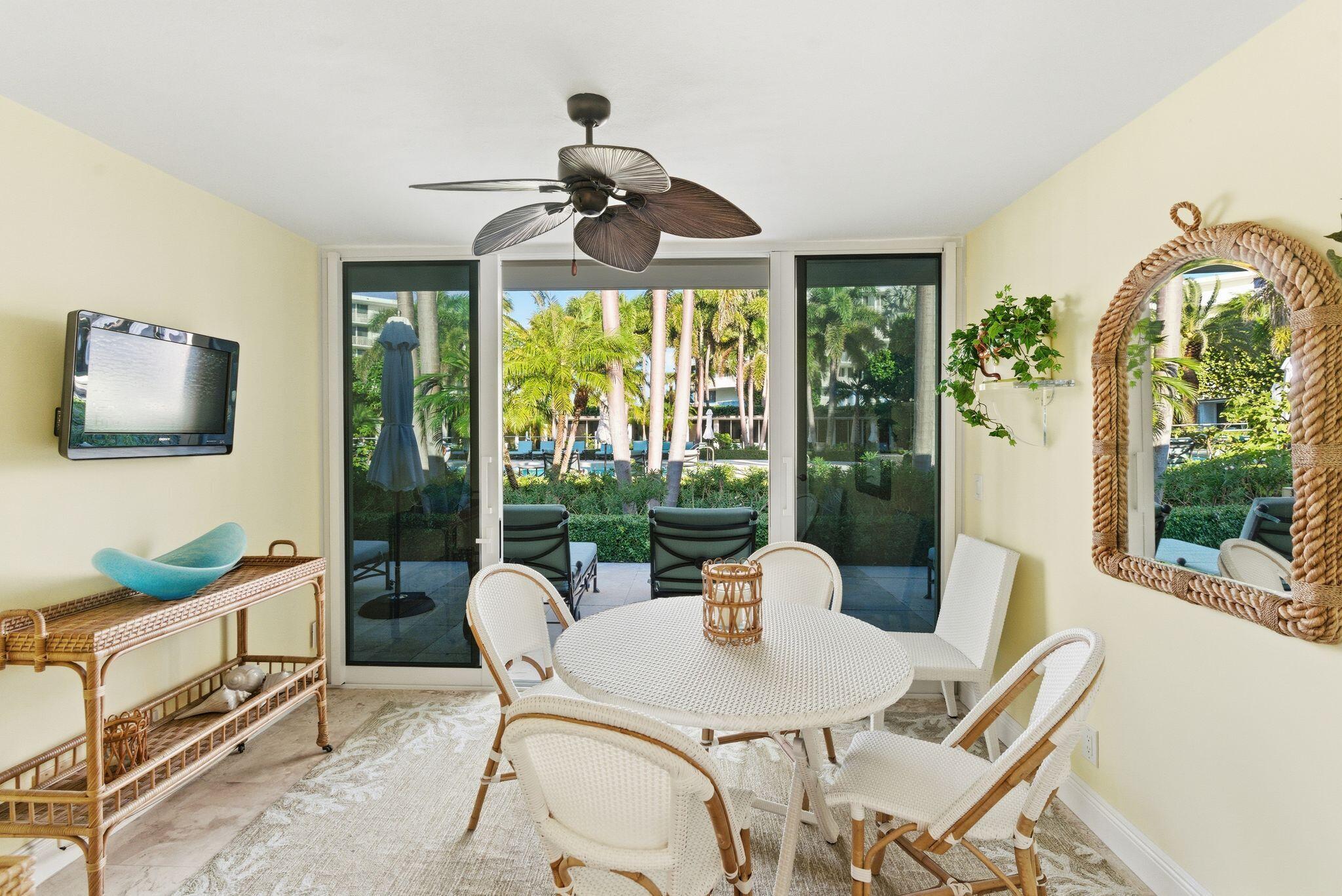 2500 South Ocean Boulevard, Unit 1A1 Palm Beach, FL 33480 - Photo 30 of 34 a view of a dining room with furniture window and outside view