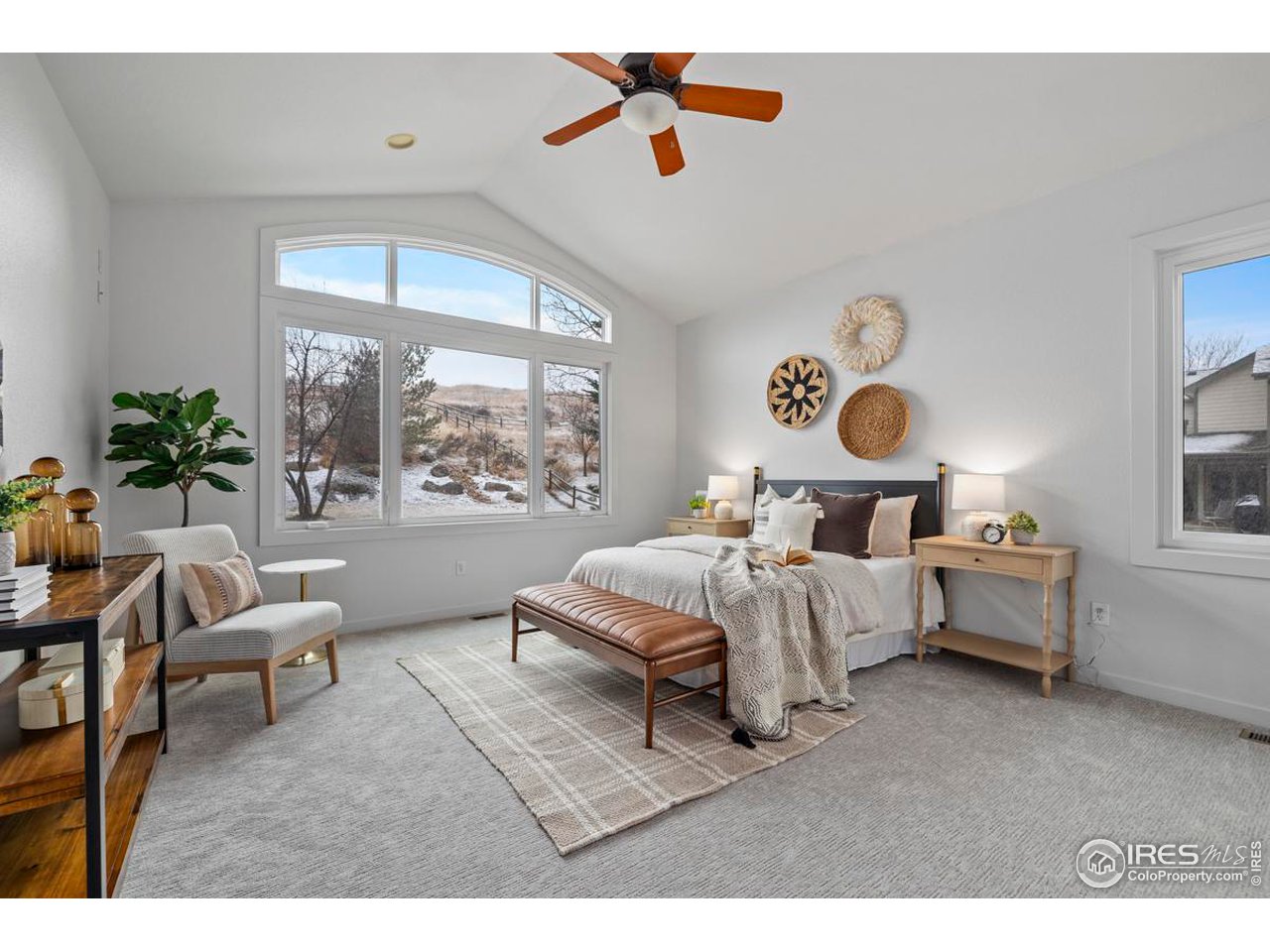 2097 Meander Road Windsor, CO 80550 - Photo 13 of 33 a living room with furniture and a large window
