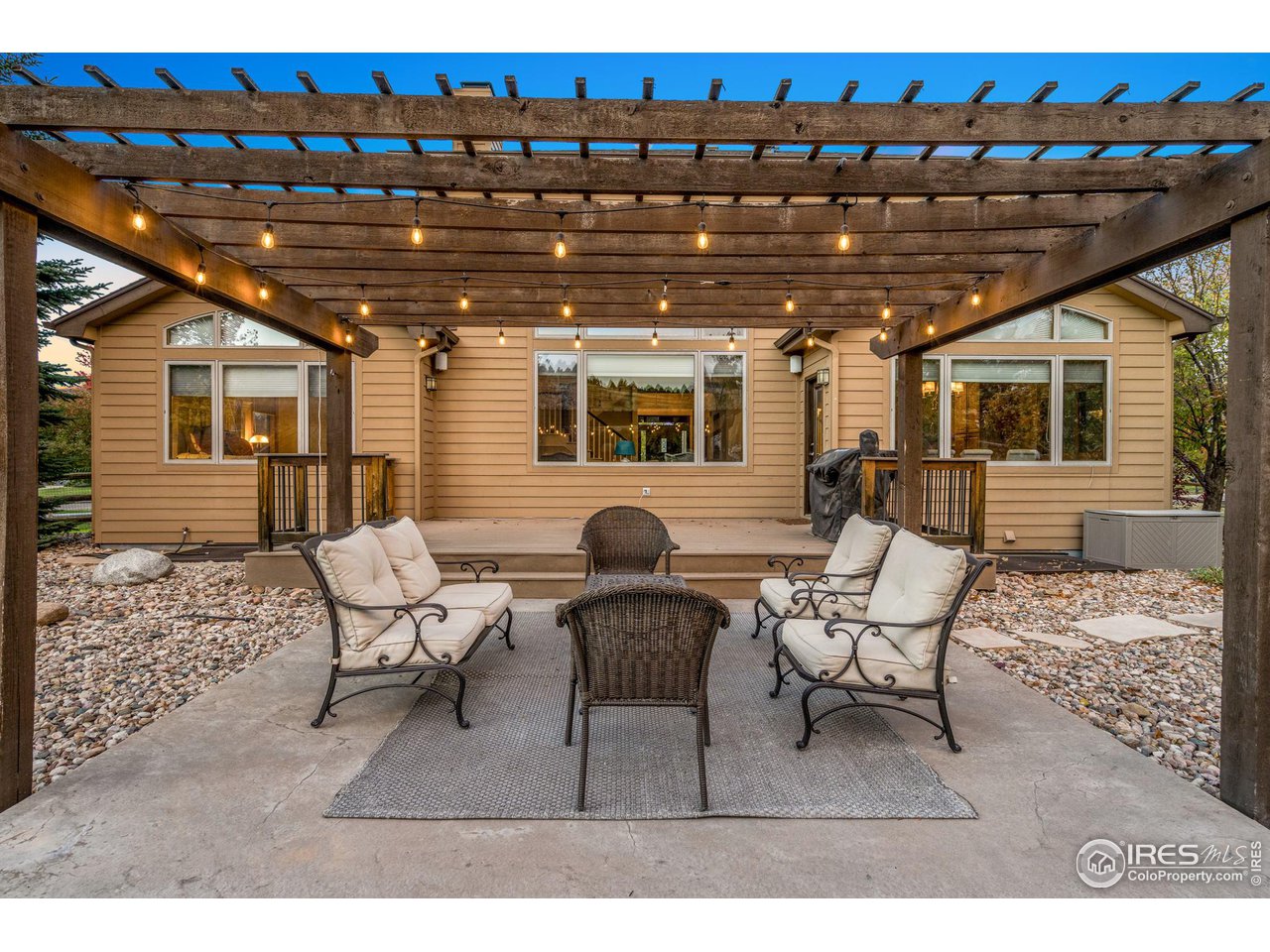 2097 Meander Road Windsor, CO 80550 - Photo 27 of 33 a building outdoor space with patio furniture