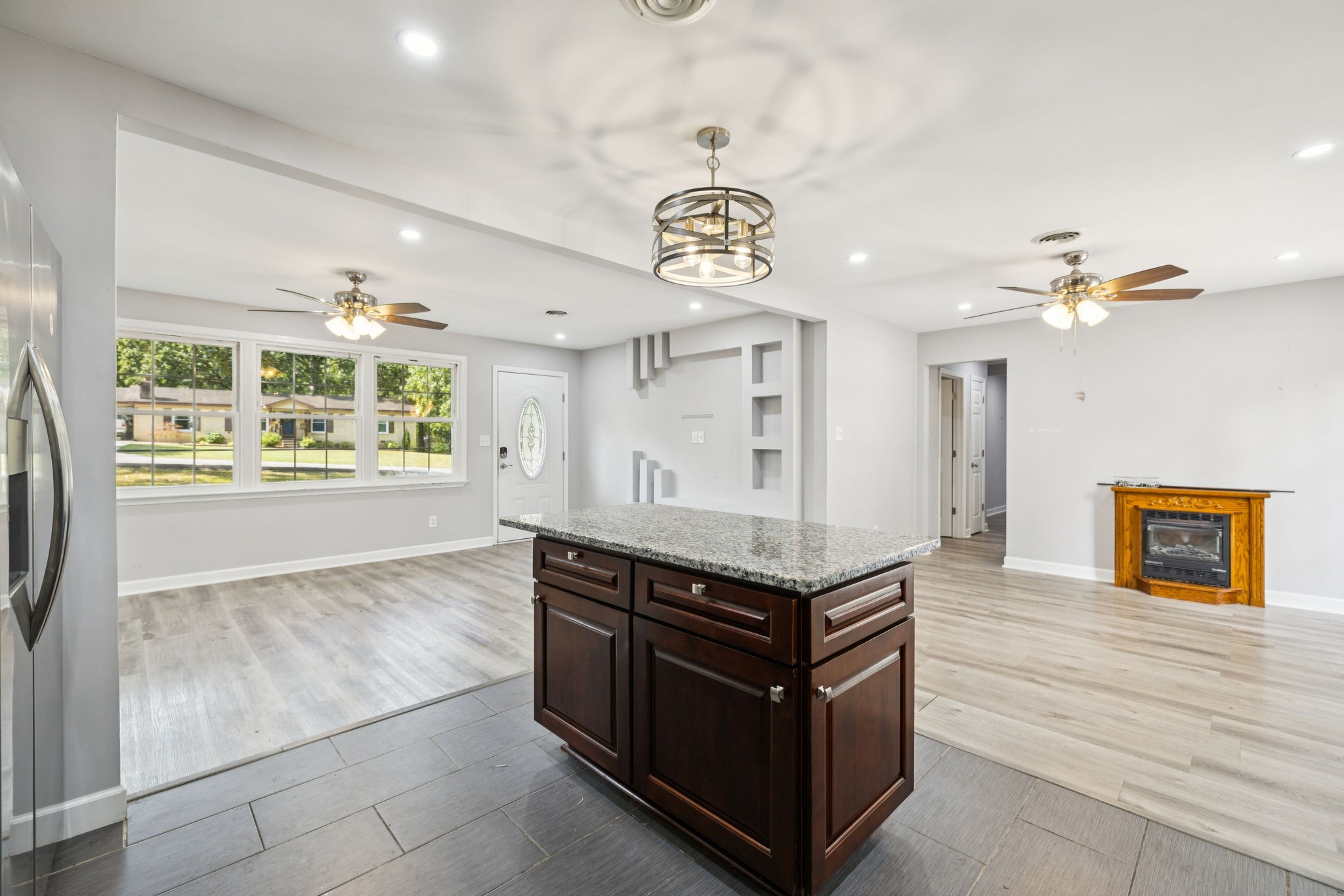 102 Warren Place Dickson, TN 37055 - Photo 11 of 52 a kitchen with stainless steel appliances granite countertop a stove and a refrigerator