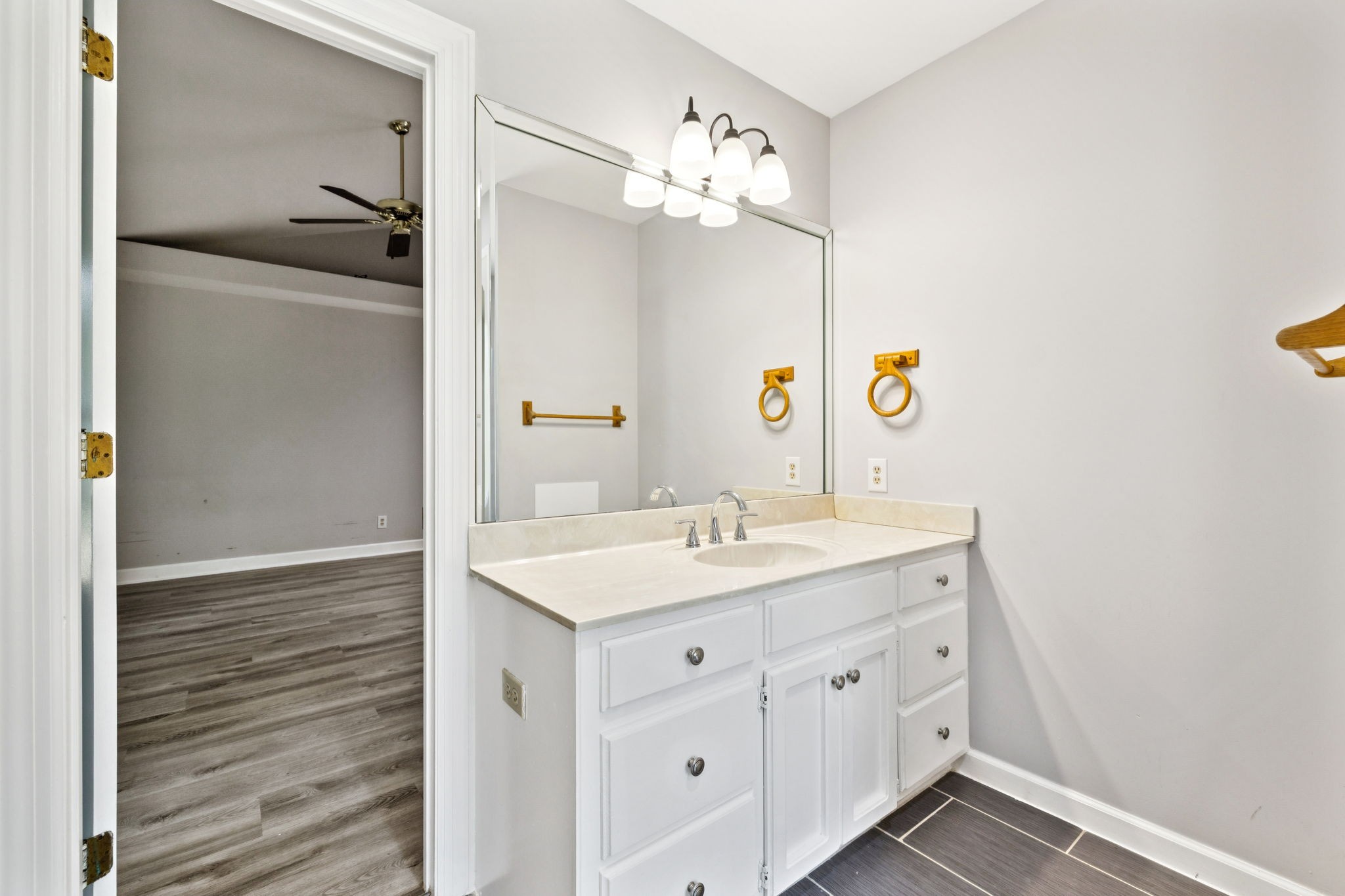 102 Warren Place Dickson, TN 37055 - Photo 35 of 52 a bathroom with a sink a vanity and a mirror