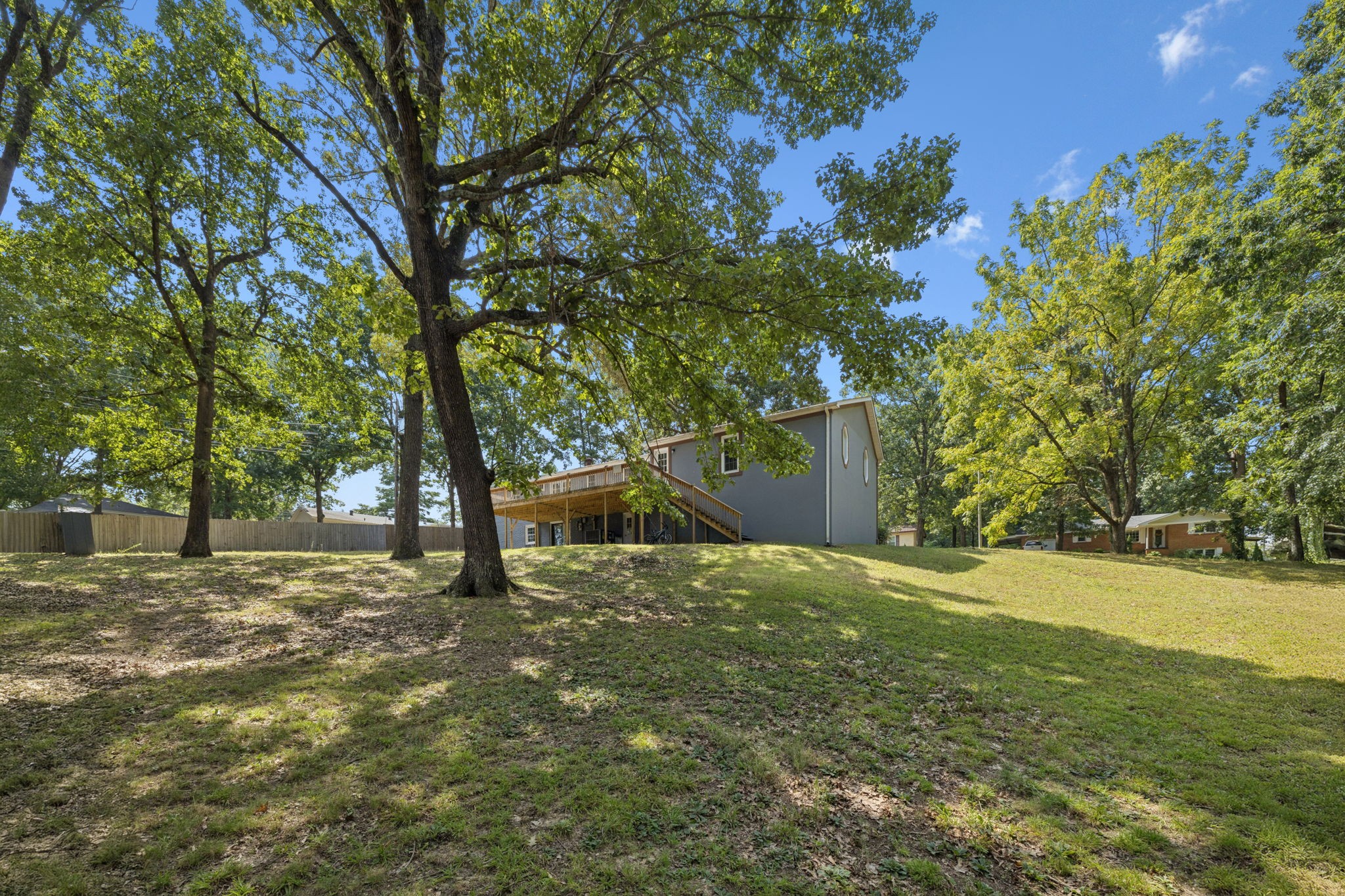 102 Warren Place Dickson, TN 37055 - Photo 51 of 52 a house with trees in front of it