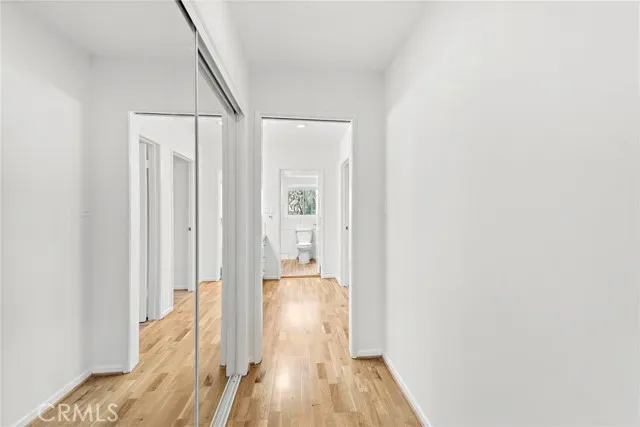 a view of wooden floor in an empty room