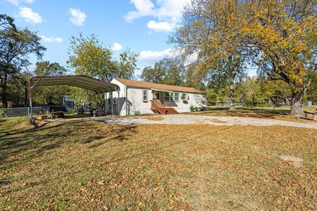 a swimming pool view with a outdoor seating