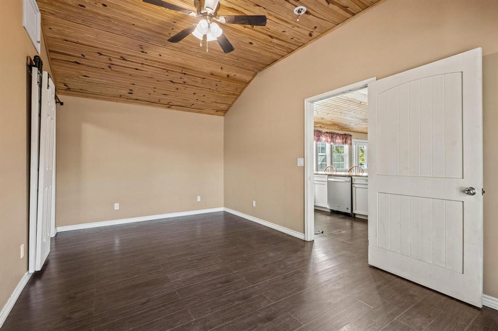 105 Reich Street Bonham, TX 75418 - Photo 17 of 31 wooden floor in an empty room