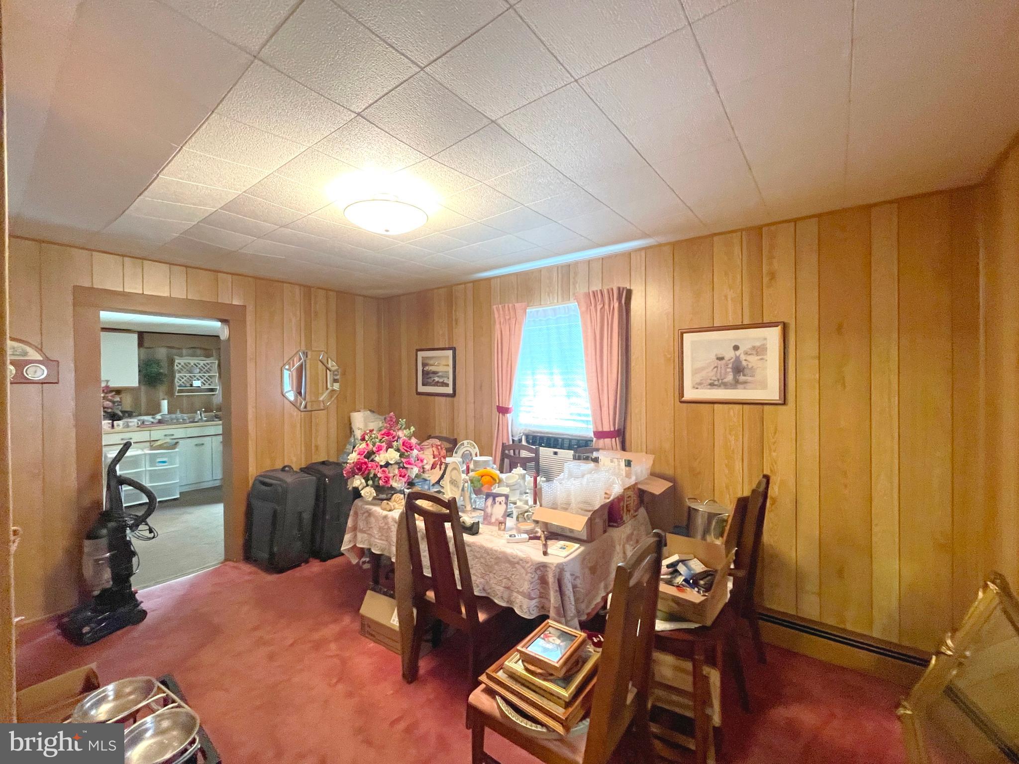6700 Hungerford Road Bryans Road, MD 20616 - Photo 10 of 36 a view of a dining room with furniture window and wooden floor