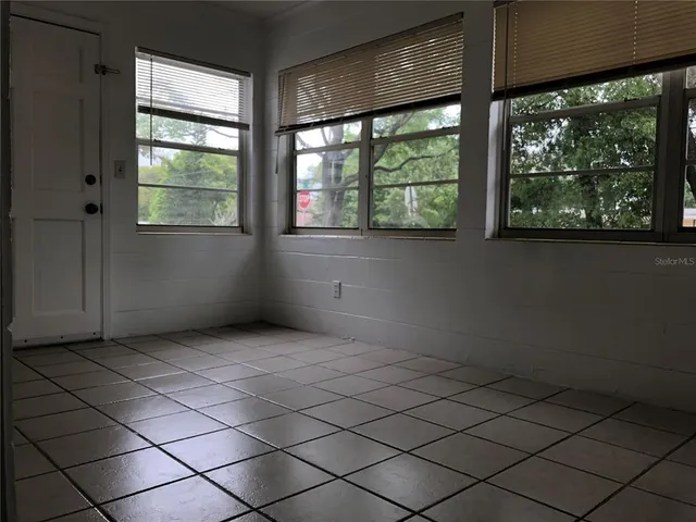 an empty room with windows