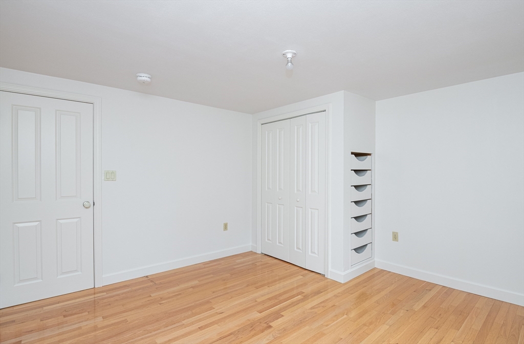 6 Island Park Road Ipswich, MA 01938 - Photo 28 of 41 a view of wooden floor and windows in a room