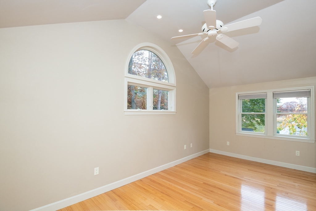 6 Island Park Road Ipswich, MA 01938 - Photo 30 of 41 an empty room with windows and fan