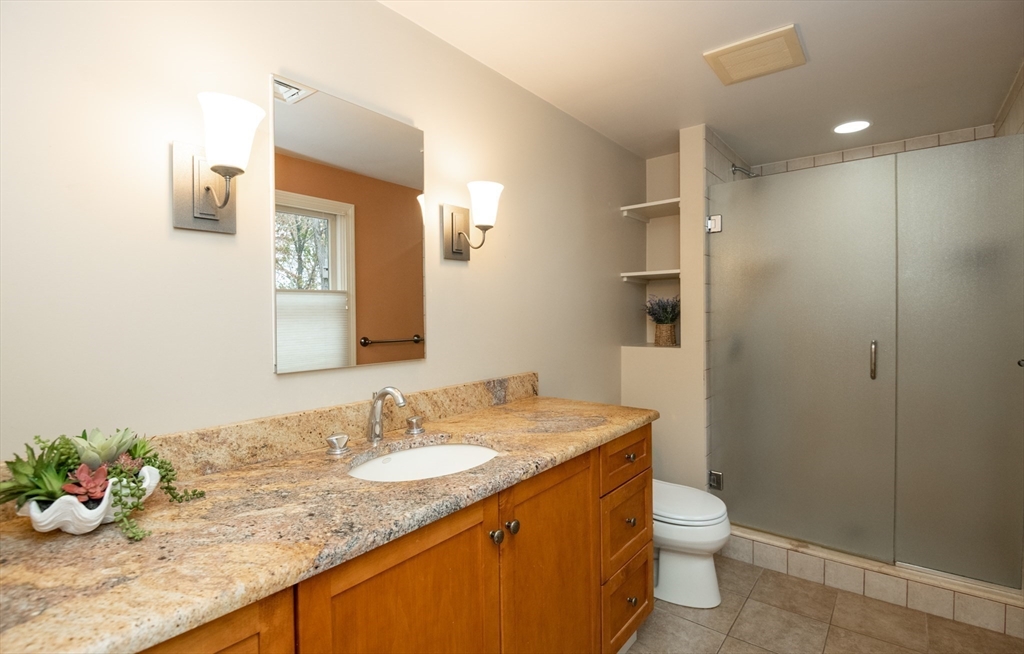 6 Island Park Road Ipswich, MA 01938 - Photo 35 of 41 a bathroom with a granite countertop sink toilet and shower