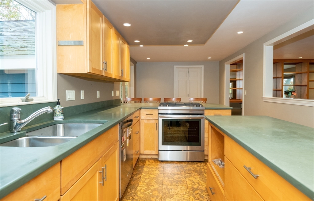 6 Island Park Road Ipswich, MA 01938 - Photo 8 of 41 a kitchen with a sink and a stove top oven