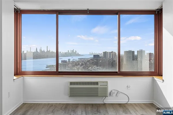 a view of a glass door and a window