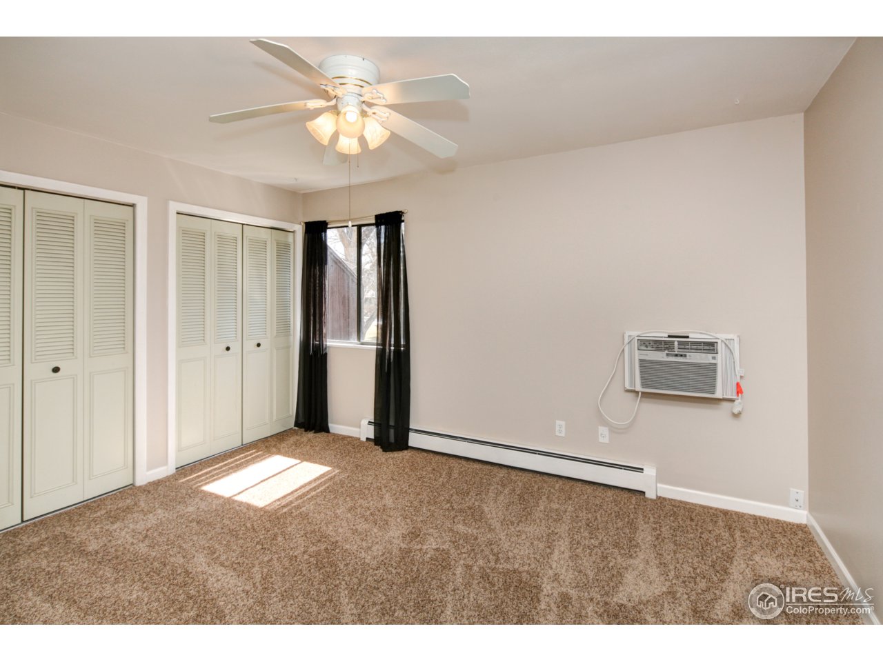 809 East Drake Road, Unit 103 Fort Collins, CO 80525 - Photo 9 of 19 Master Bedroom