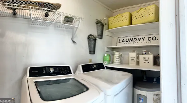 a kitchen with a stove and a sink