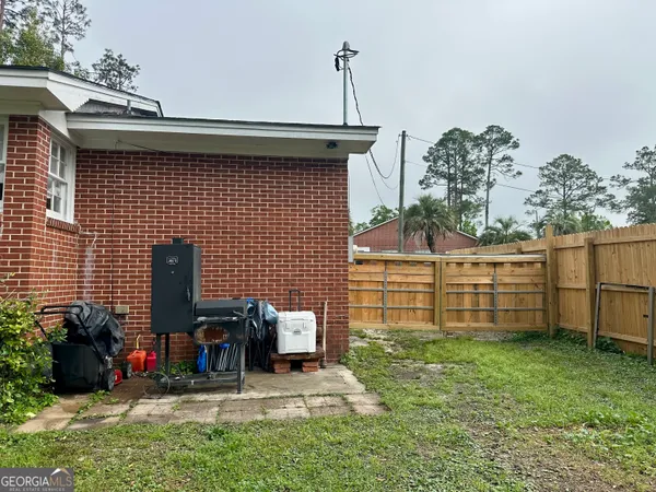 a view of a backyard with plants