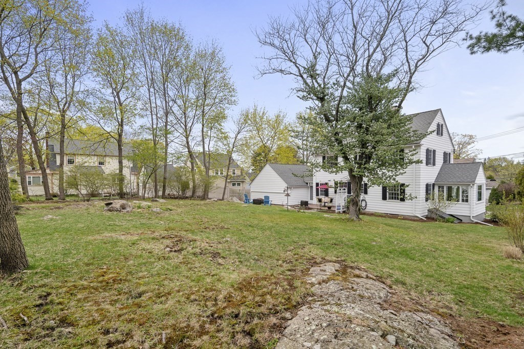 7 Perkins Road Winchester, MA 01890 - Photo 31 of 38 a front view of house with yard and green space