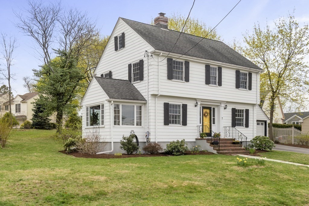7 Perkins Road Winchester, MA 01890 - Photo 32 of 38 a front view of house with yard and green space