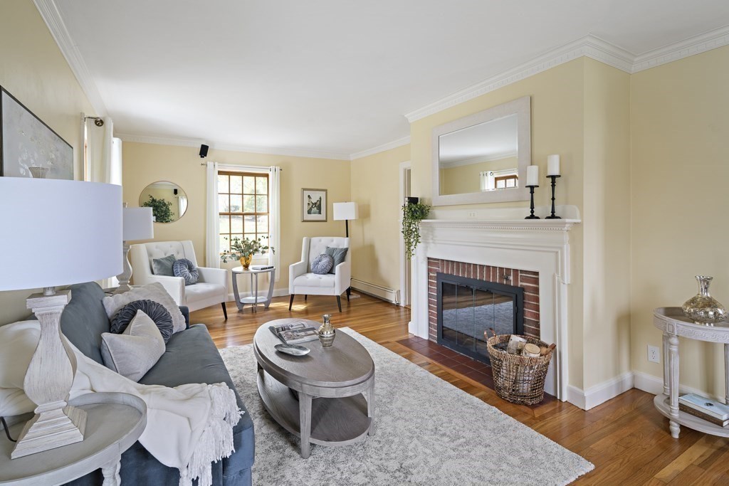 7 Perkins Road Winchester, MA 01890 - Photo 5 of 38 a living room with furniture and a fireplace
