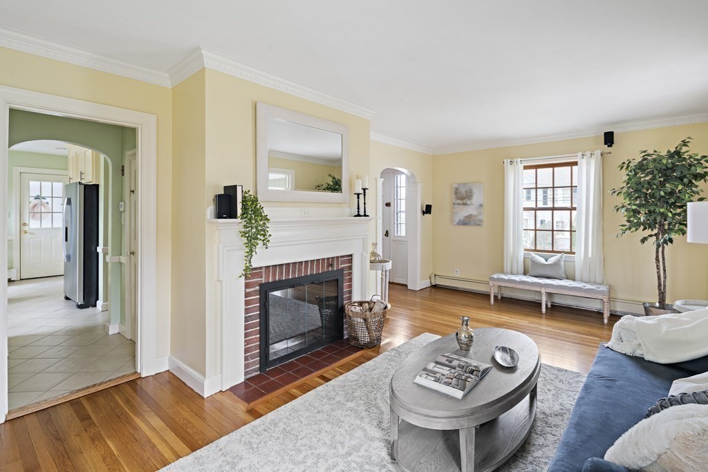 7 Perkins Road Winchester, MA 01890 - Photo 6 of 38 a living room with furniture and a fireplace