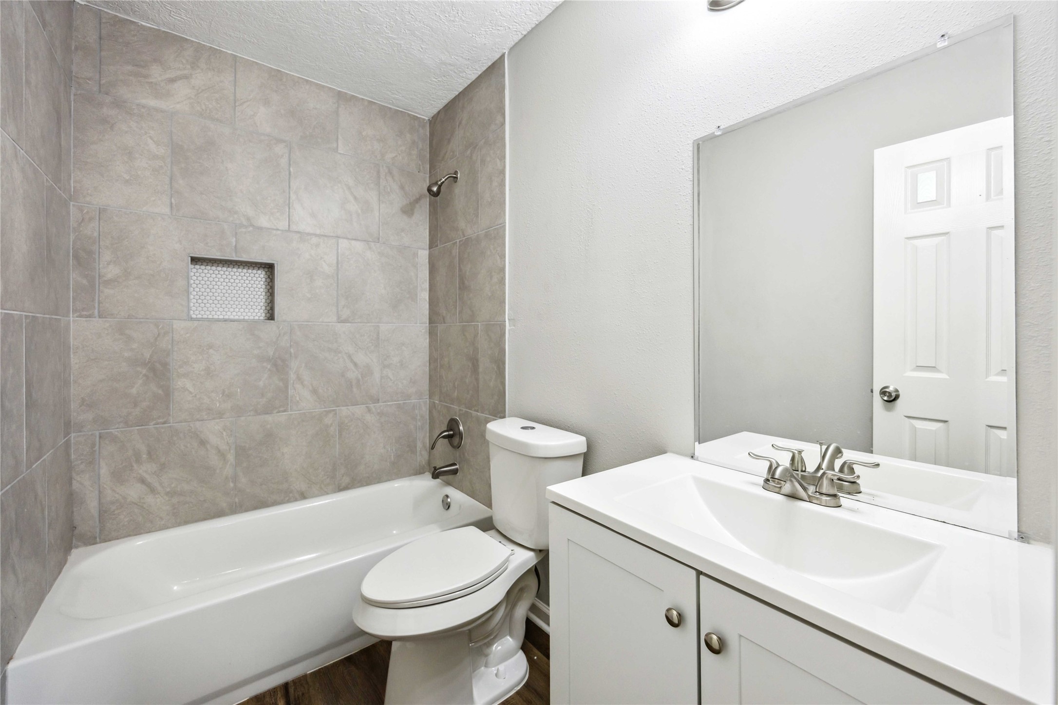 7150 Mobud Drive Houston, TX 77074 - Photo 14 of 29 a bathroom with a sink a toilet and shower
