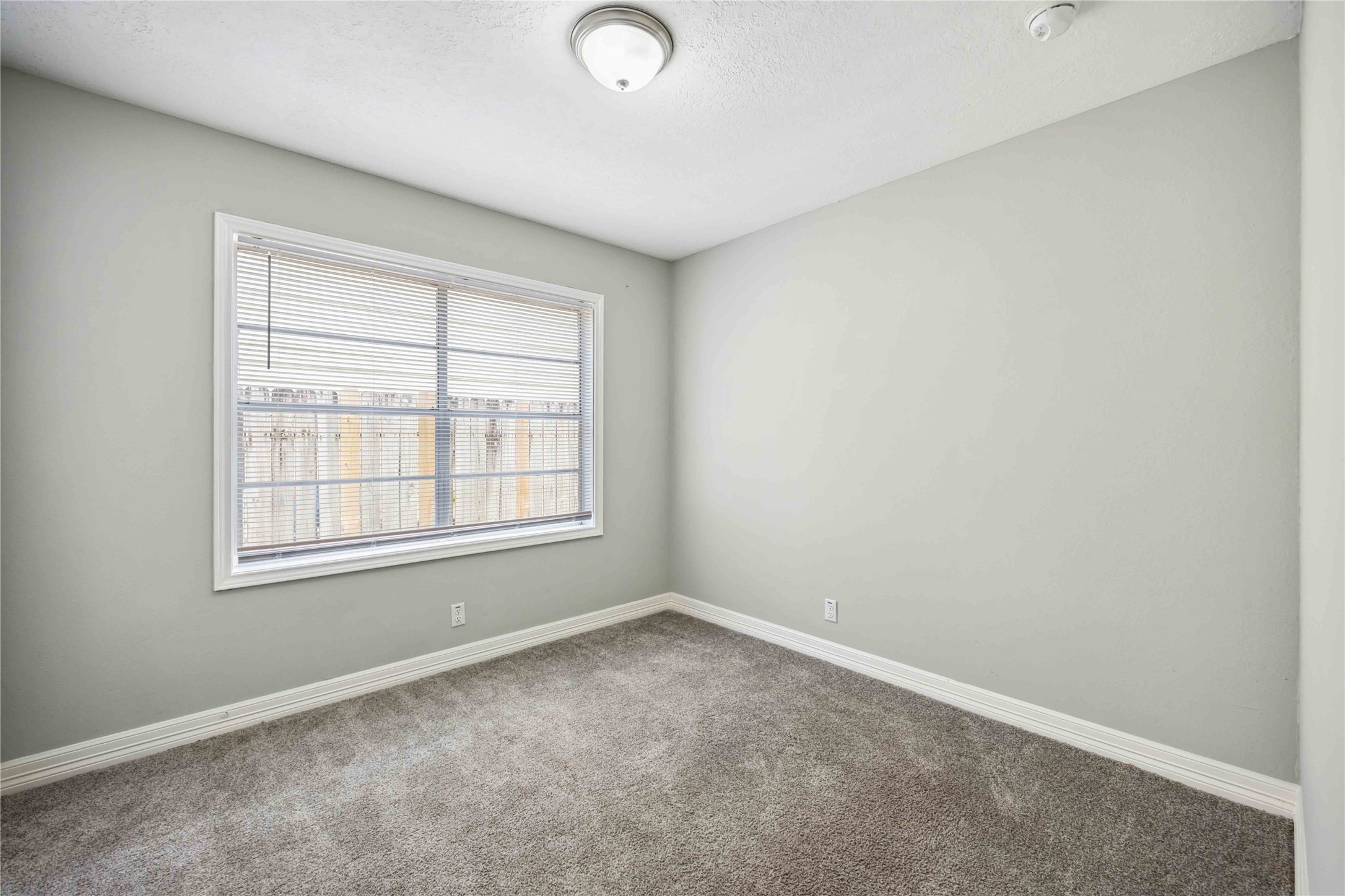 7150 Mobud Drive Houston, TX 77074 - Photo 17 of 29 an empty room with a window