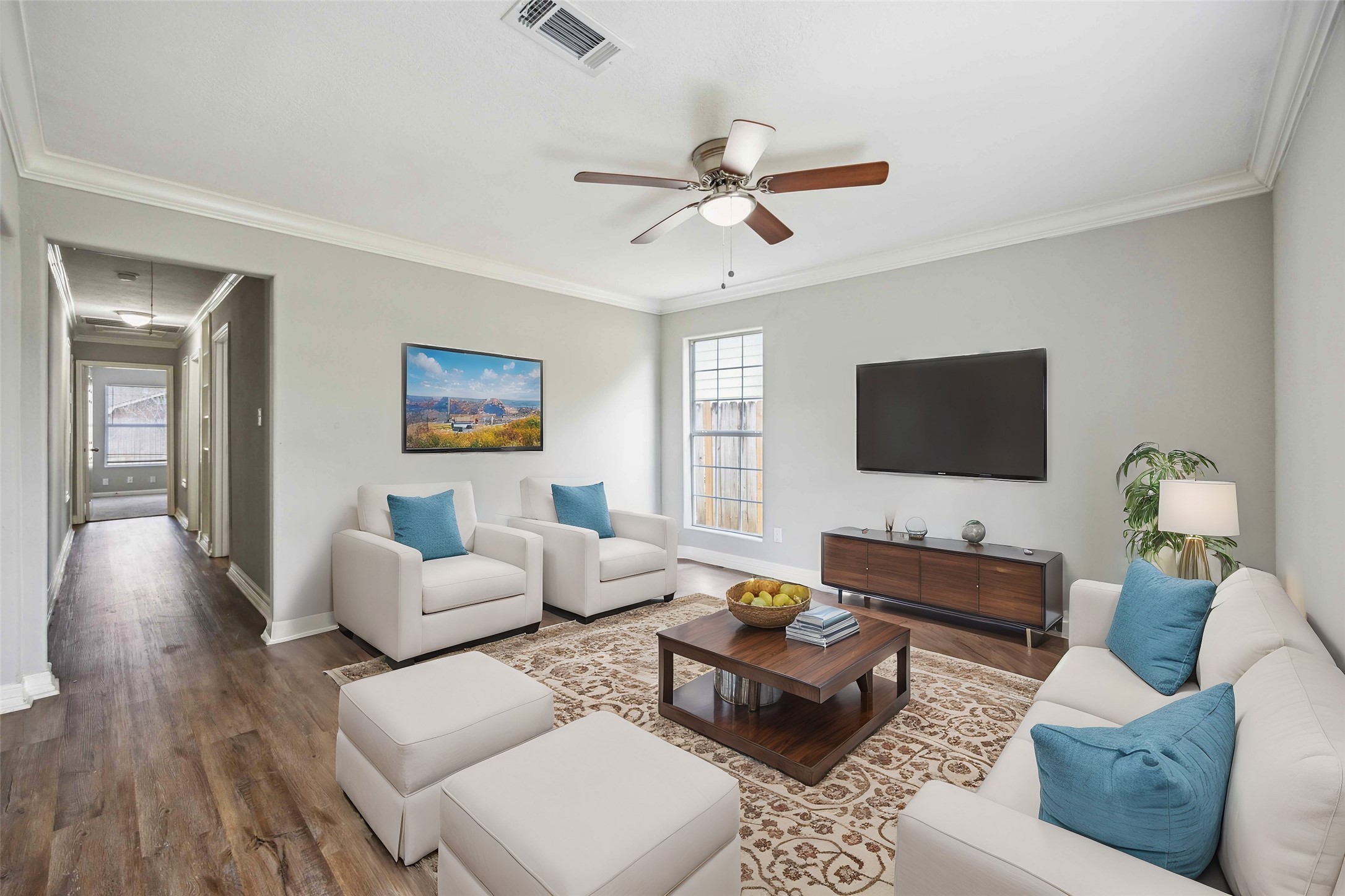 7150 Mobud Drive Houston, TX 77074 - Photo 2 of 29 a living room with furniture and a flat screen tv