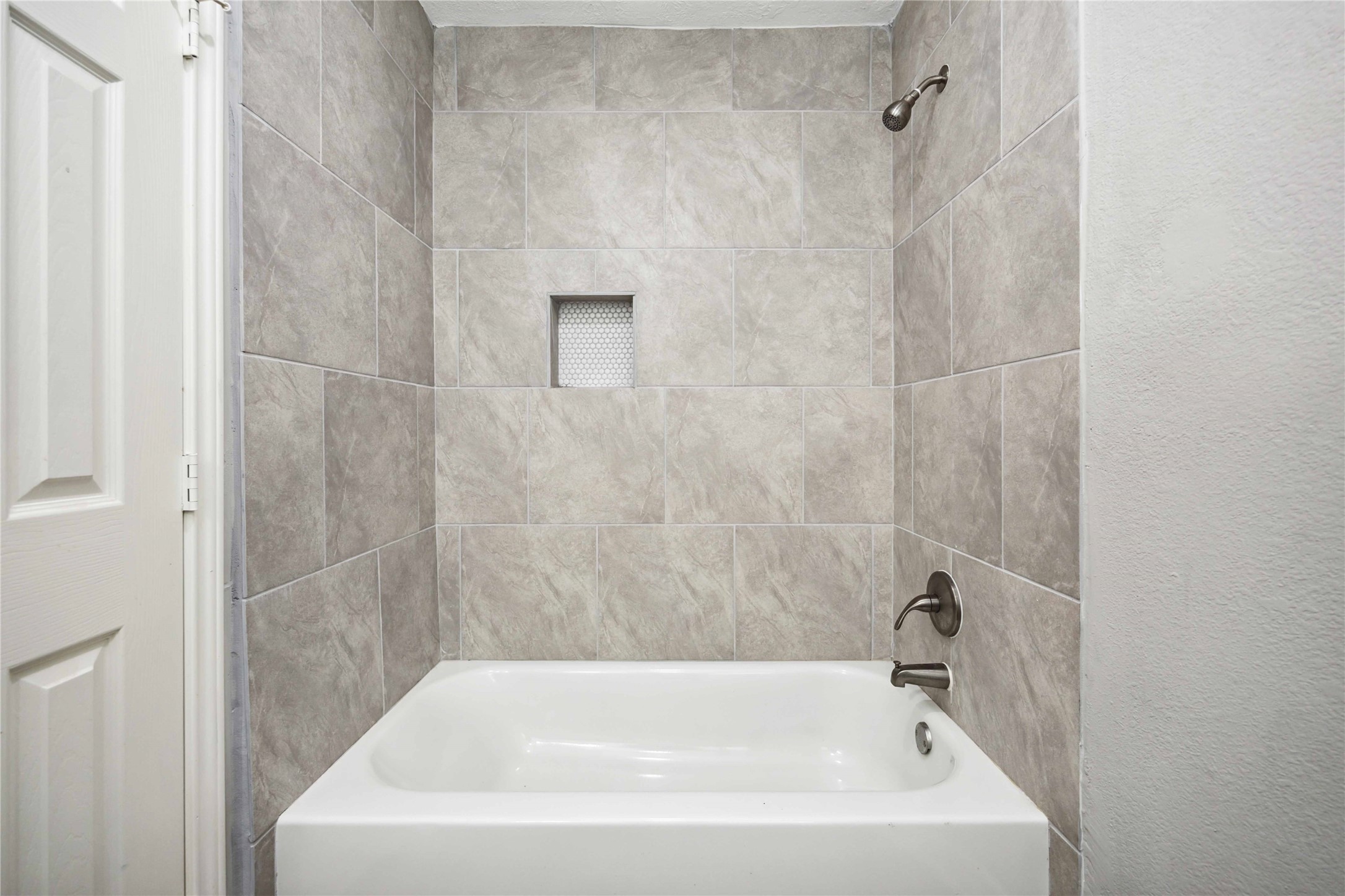 7150 Mobud Drive Houston, TX 77074 - Photo 22 of 29 a white bath tub sitting next to a white sink