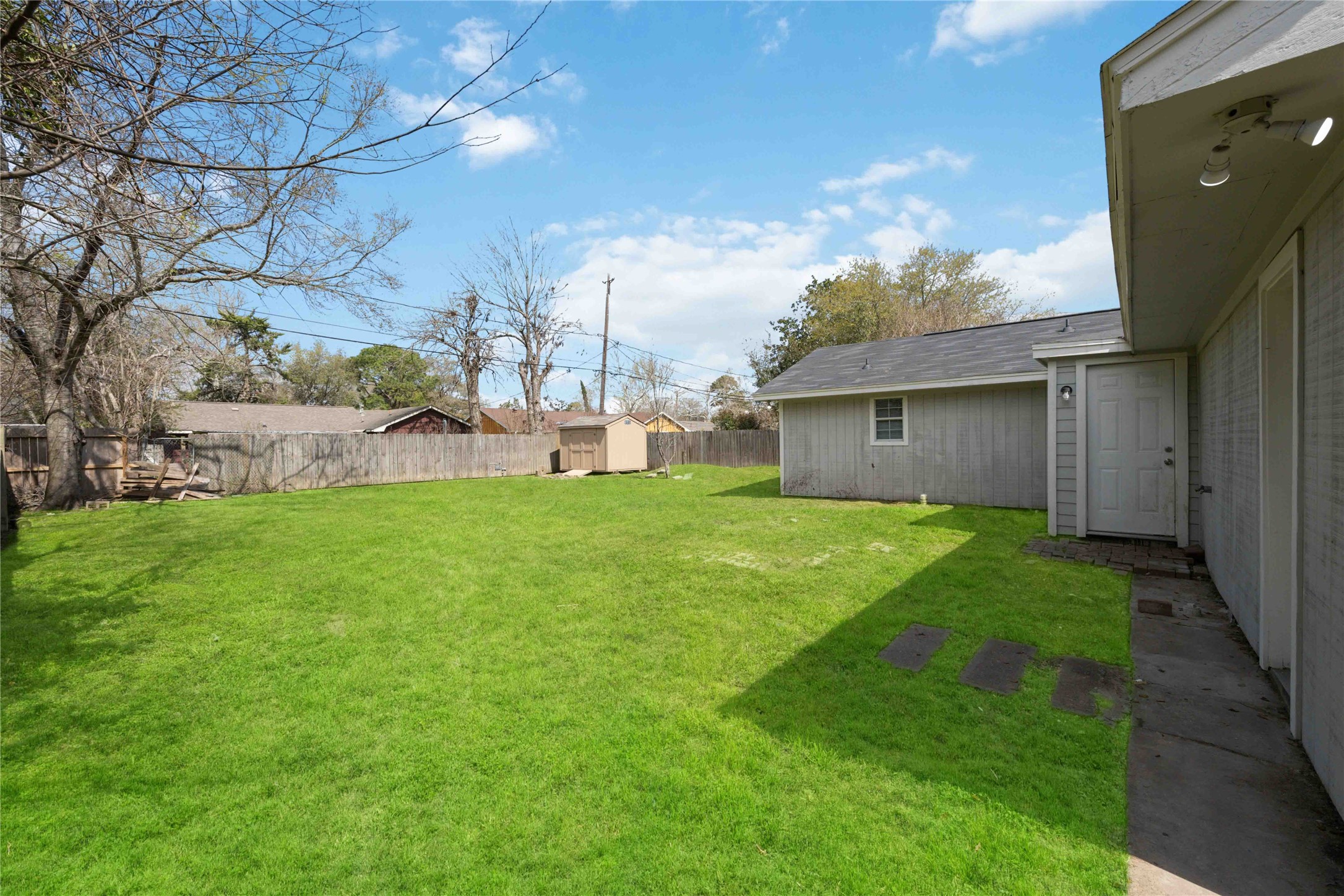 7150 Mobud Drive Houston, TX 77074 - Photo 27 of 29 a house view with a garden space