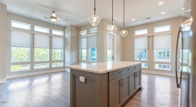 a bathroom with a sink and a large window