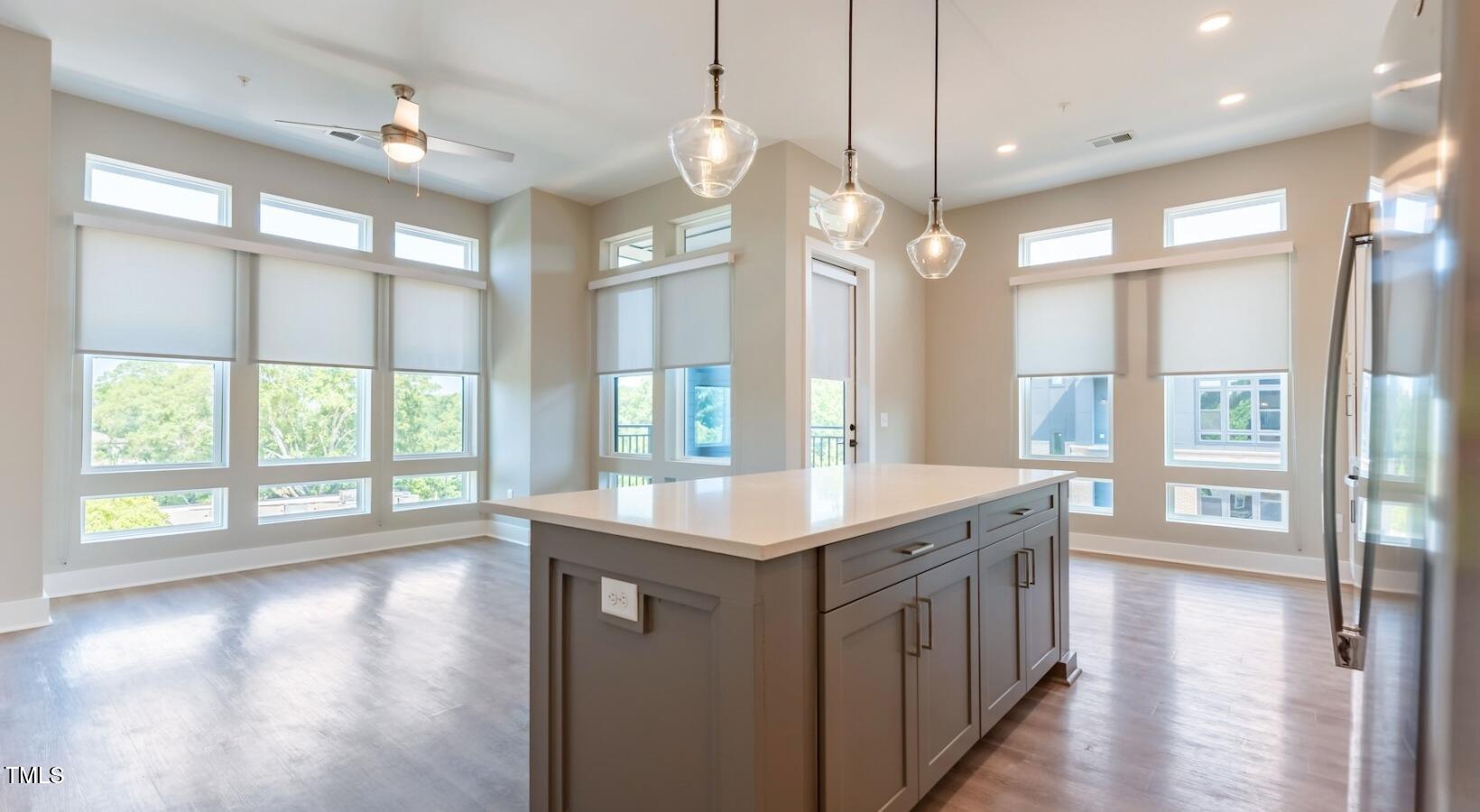 255 East Chatham Street, Unit A1 Cary, NC 27511 - Photo 12 of 31 a bathroom with a sink and a large window