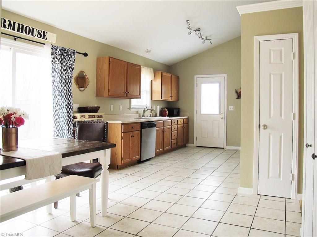 7999 Bartonshire Drive Oak Ridge, NC 27310 - Photo 3 of 11 Gallery Image 3