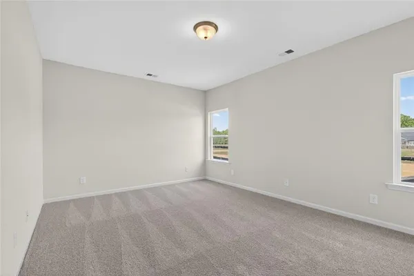 a bathroom with a sink a mirror and vanity