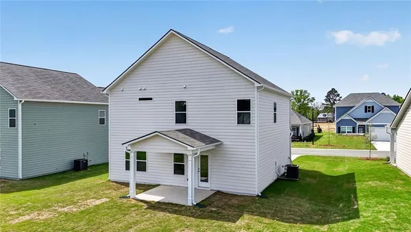 a view of bathroom with a sink and mirror