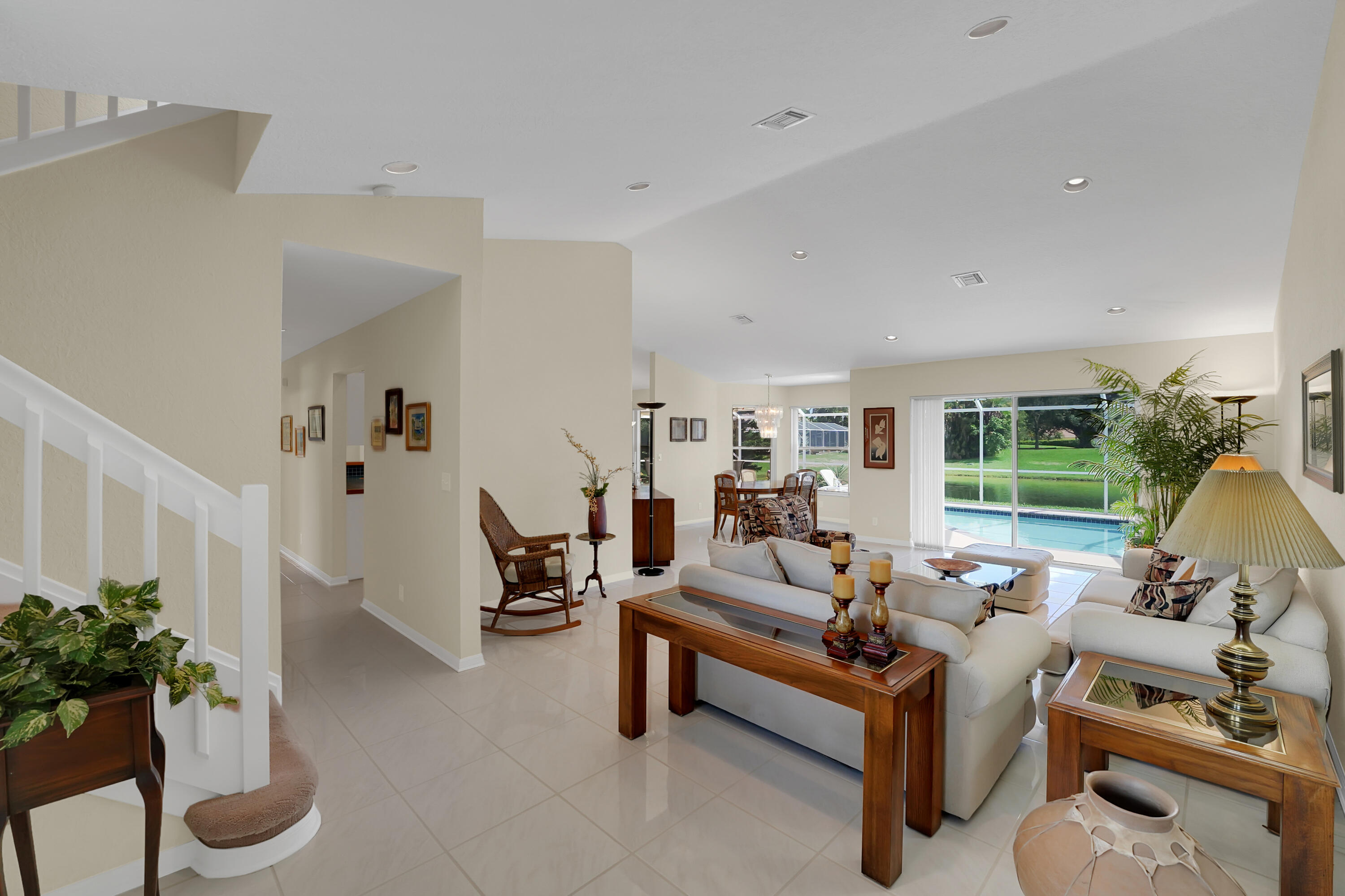 22331 Kettle Creek Way Boca Raton, FL 33428 - Photo 16 of 86 a living room with furniture plant and a large window