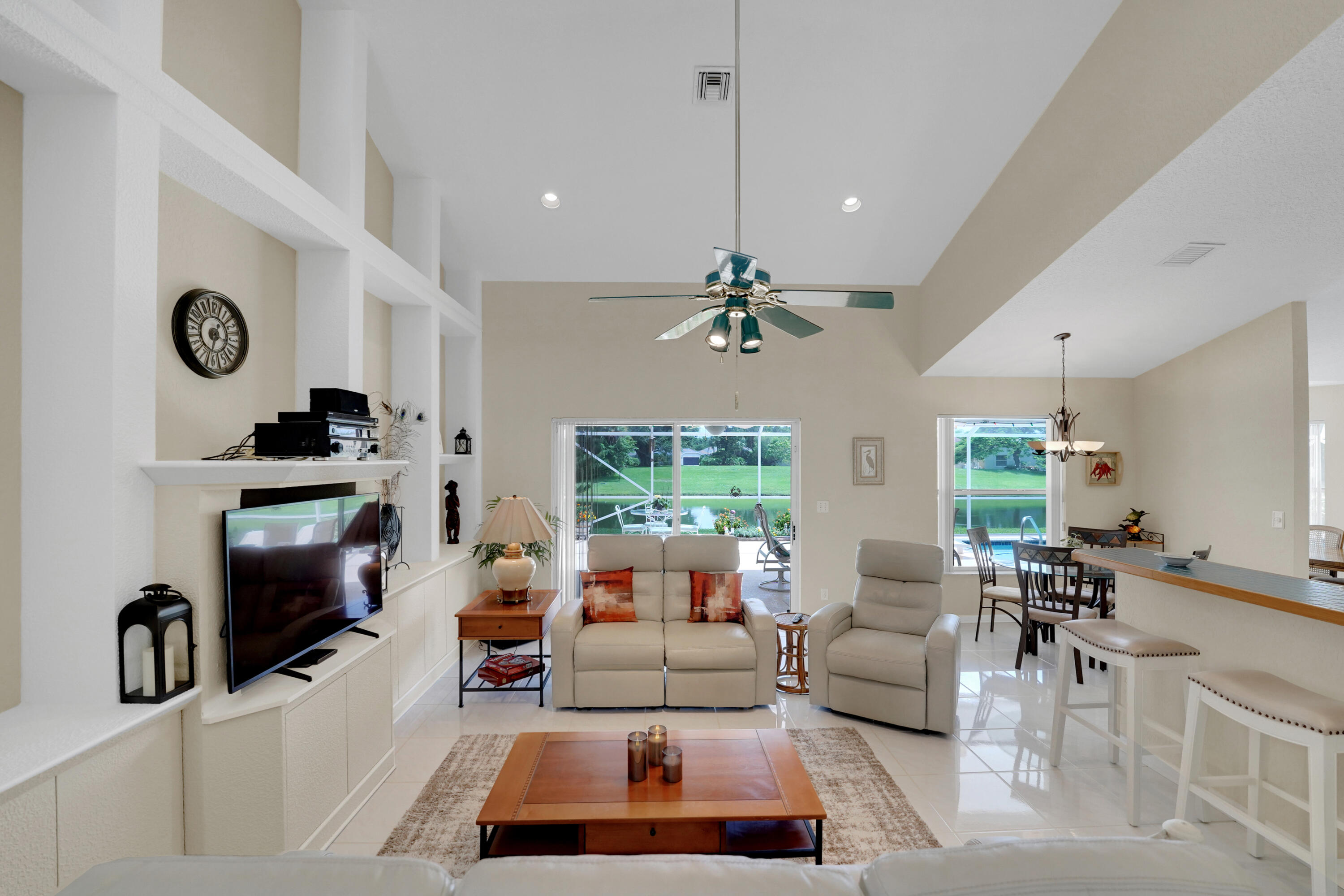 22331 Kettle Creek Way Boca Raton, FL 33428 - Photo 27 of 86 a living room with furniture and a flat screen tv