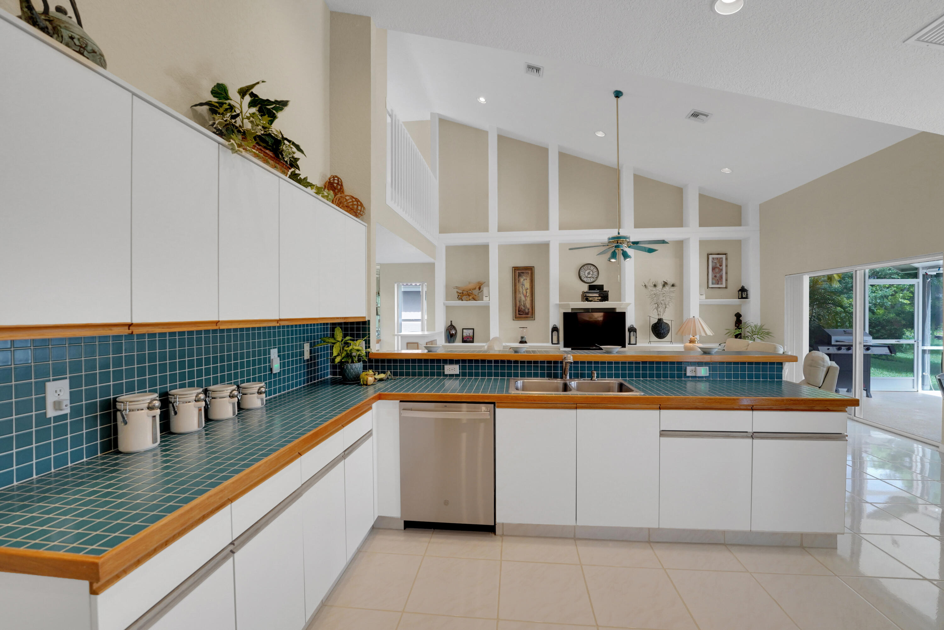22331 Kettle Creek Way Boca Raton, FL 33428 - Photo 36 of 86 a kitchen with stainless steel appliances granite countertop a sink and a counter space