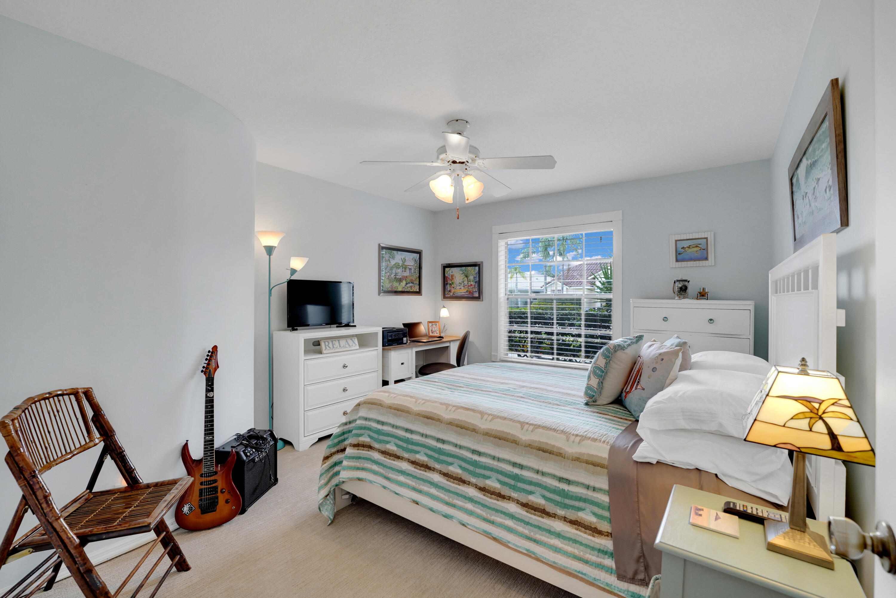 22331 Kettle Creek Way Boca Raton, FL 33428 - Photo 48 of 86 a bedroom with a bed a window and chair