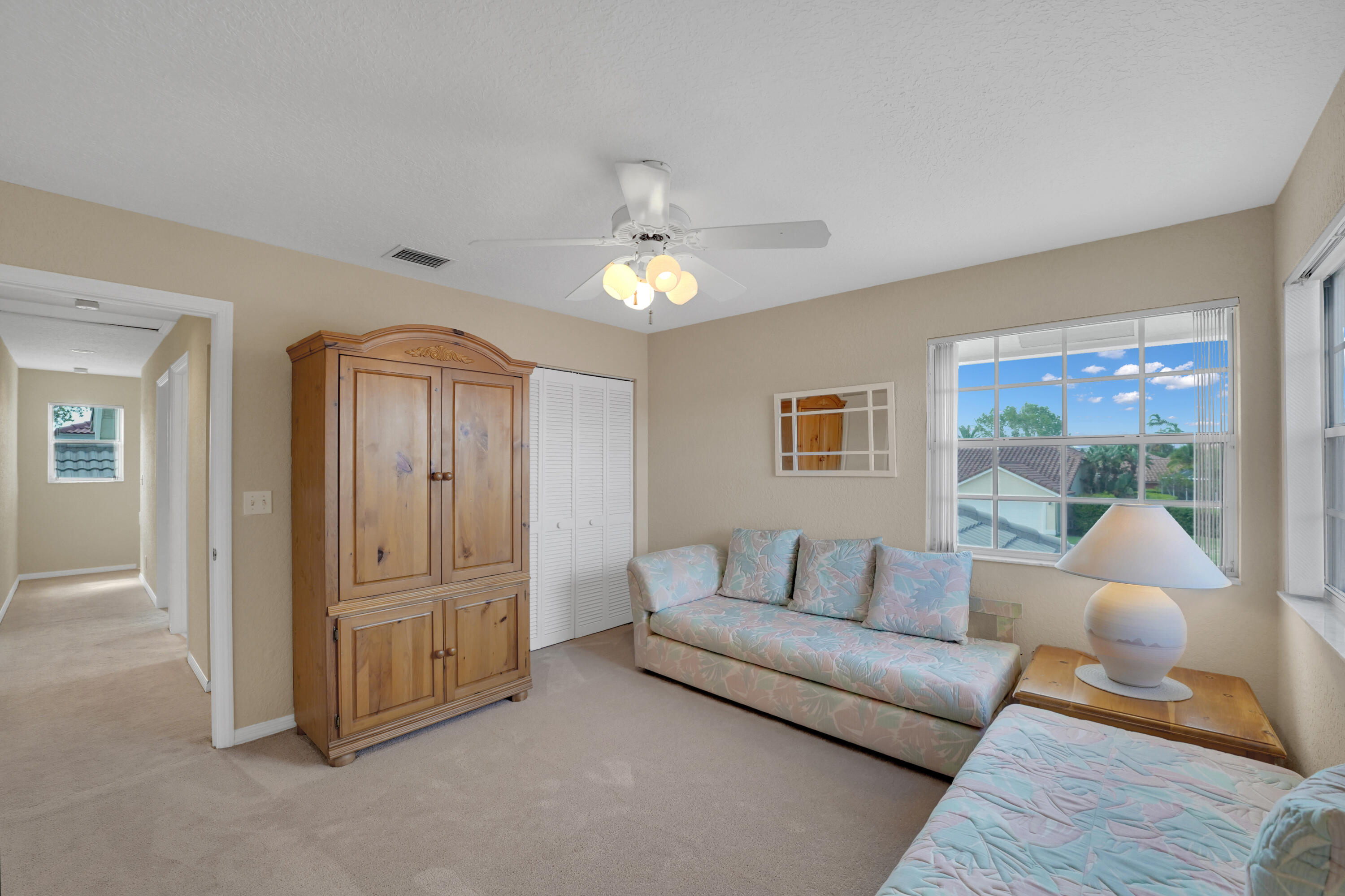 22331 Kettle Creek Way Boca Raton, FL 33428 - Photo 55 of 86 a living room with furniture and a chandelier