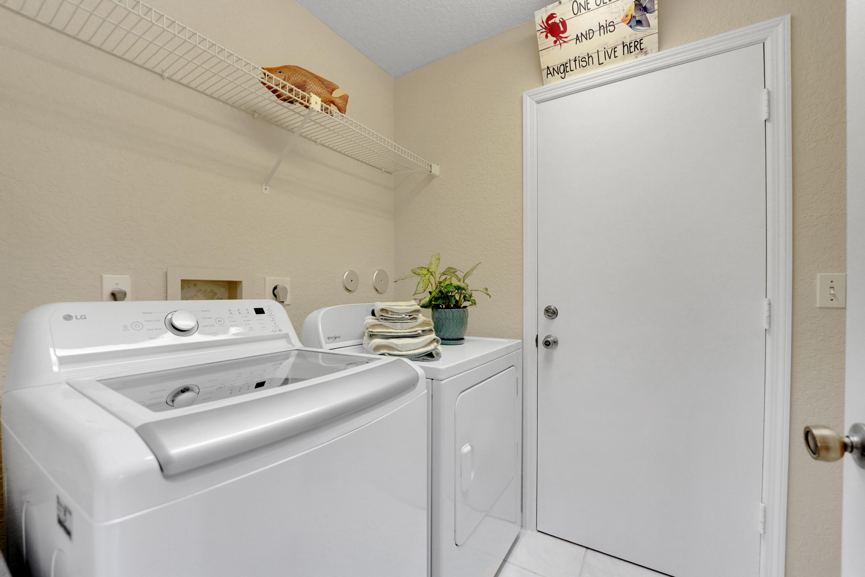 22331 Kettle Creek Way Boca Raton, FL 33428 - Photo 70 of 86 a utility room with dryer and washer