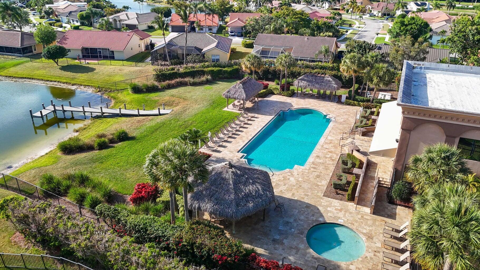 22331 Kettle Creek Way Boca Raton, FL 33428 - Photo 78 of 86 a view of a swimming pool with lounge chair