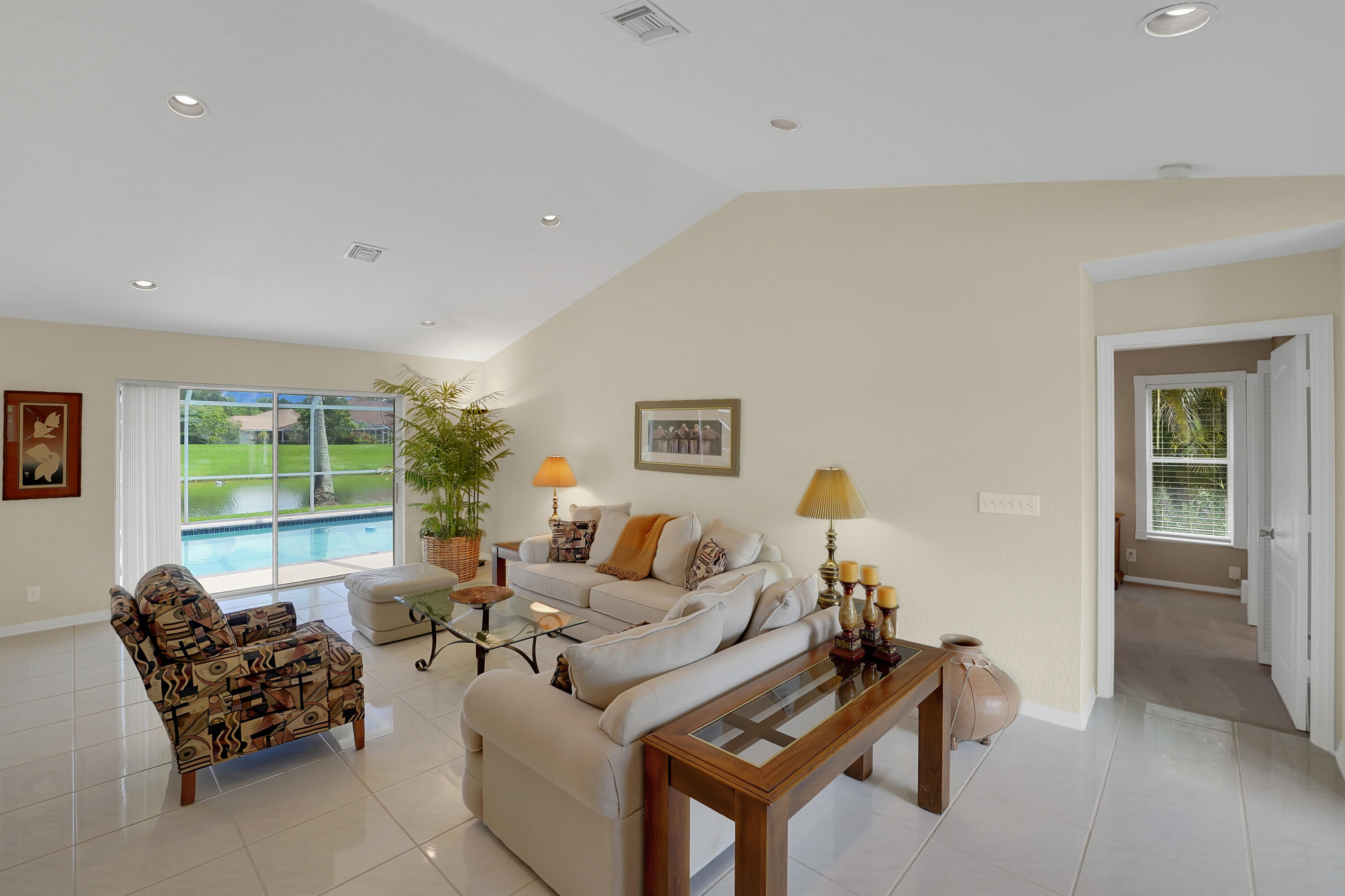 22331 Kettle Creek Way Boca Raton, FL 33428 - Photo 10 of 86 a living room with furniture and a window