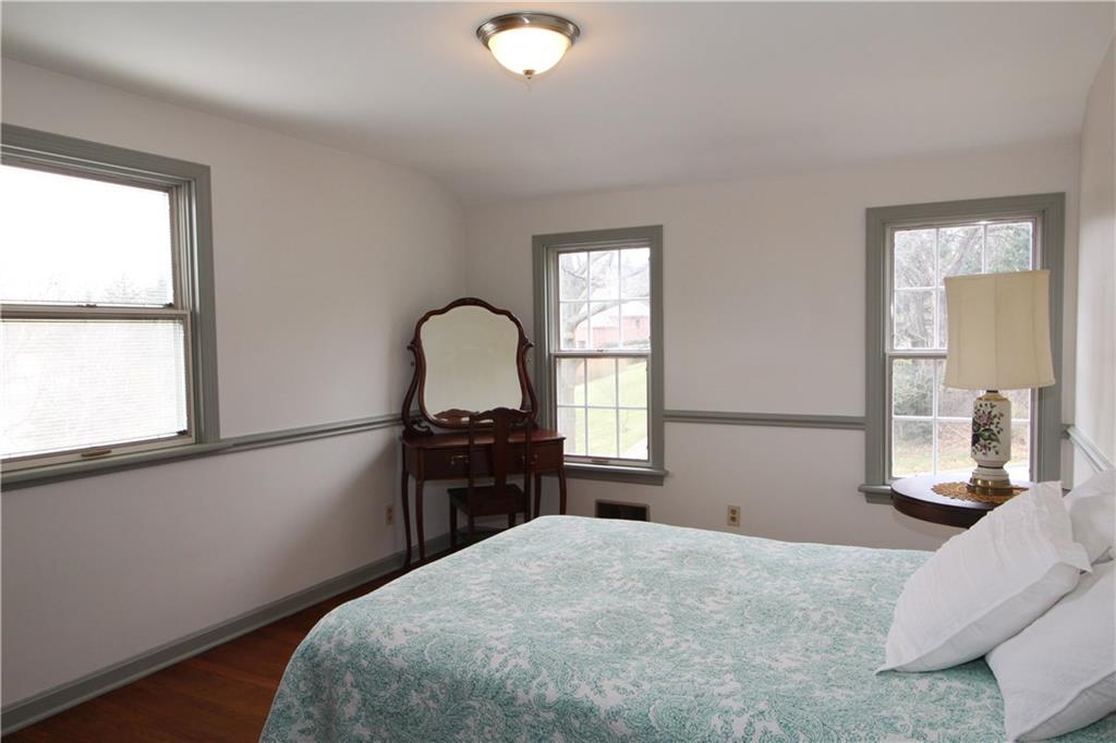 197 Seegar Road Pittsburgh, PA 15241 - Photo 19 of 25 Bedroom with loads of light and hardwood flooring.