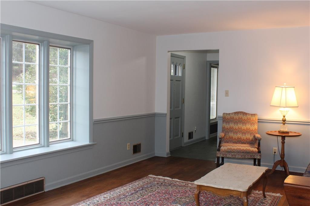 197 Seegar Road Pittsburgh, PA 15241 - Photo 4 of 25 The 21x13 living or great room boasts of a picture window for lots of natural lighting.